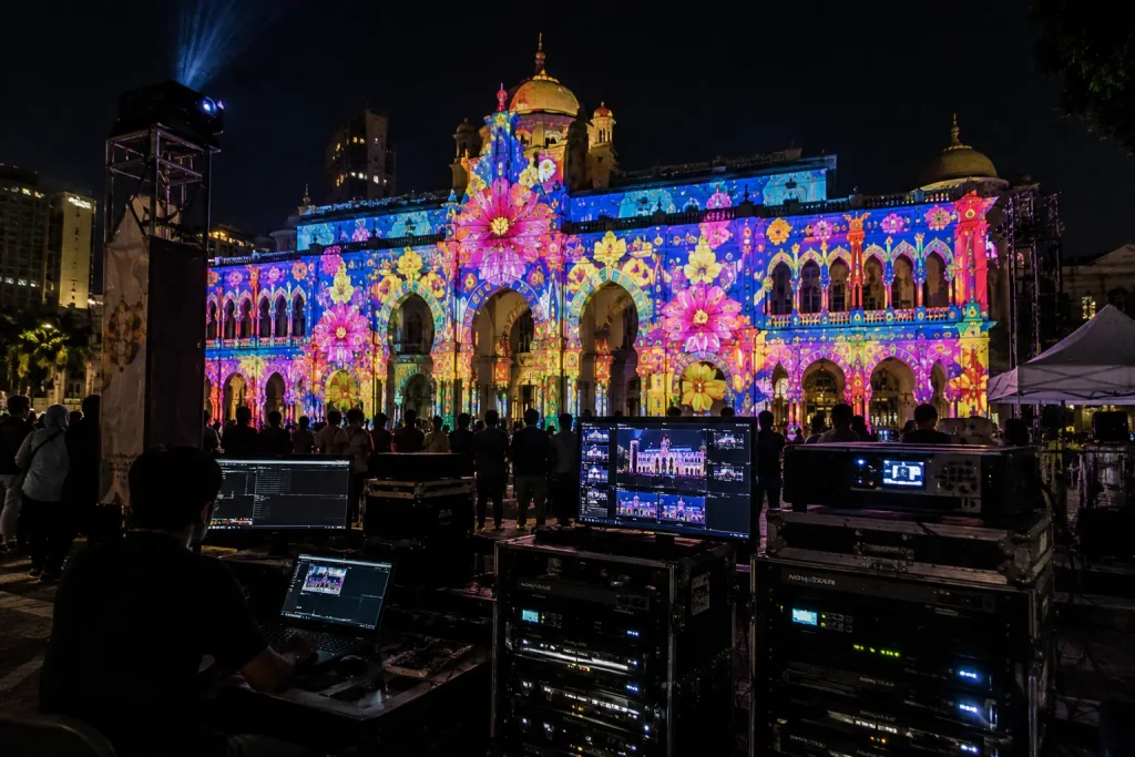 Building projection mapping in Malaysia using architectural surfaces for large-scale visual experiences.