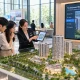 Interactive property sales gallery in Malaysia connecting a physical scale model with digital information